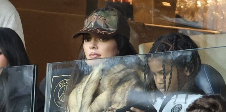 Stylish vibes: kendall jenner's camo hat and faux fur coat